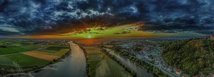Framed Print : Extensive river landscape at sunset with vivid colours