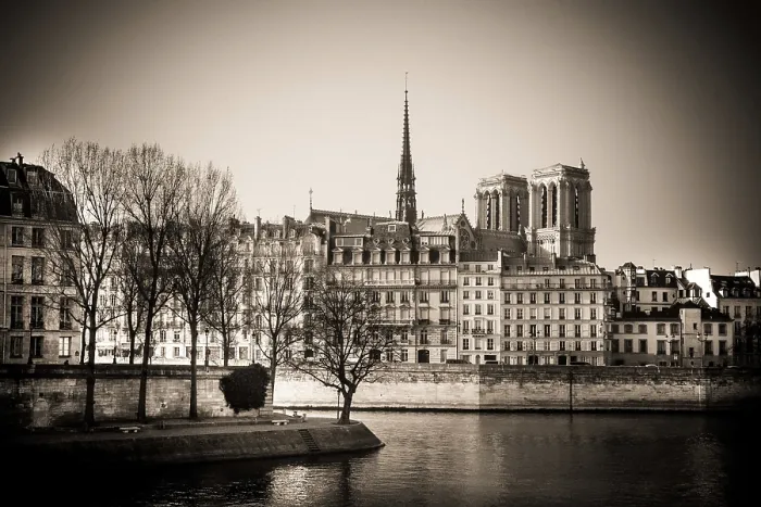 Framed Print : The exterior of Notre Dame Cathedral is prominently displayed along the Seine River in Paris Framed Print : The exterior of Notre Dame Cathedral is prominently displayed along the Seine River in Paris
