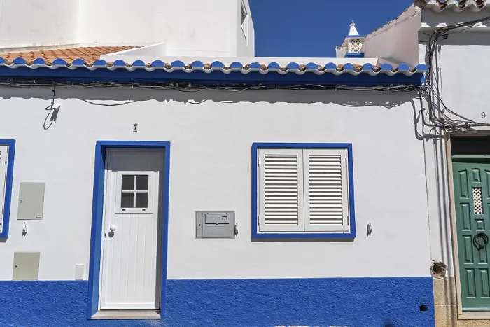 Framed Print : Facade of buildings in Tavira, old town