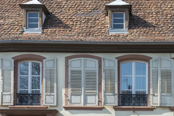 Framed Print : Facade of an old house with shingle roof and shutters Framed Print : Facade of an old house with shingle roof and shutters