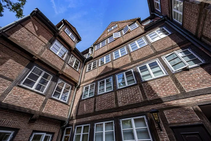 Framed Print : Facades of the historic brick buildings