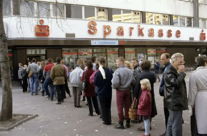 Framed Print : Fall of the Berlin Wall: queue for the welcome money at a bank in East Berlin