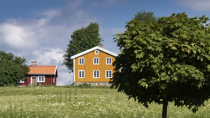 Framed Print : Falun red and Swedish yellow wooden house