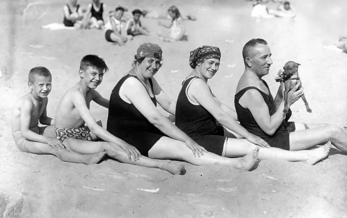 Framed Print : Family on the beach with dog ca Framed Print : Family on the beach with dog ca