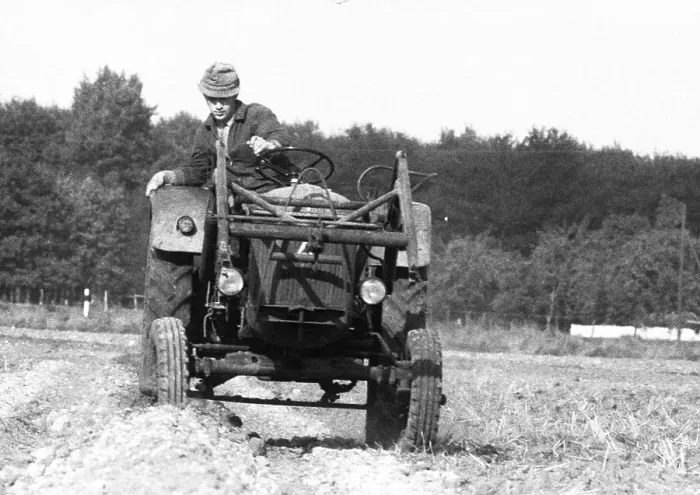 Framed Print : Farmers working in the fields in Muensterland on 10