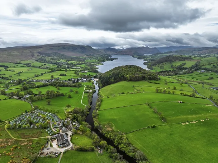 Framed Print : Farms and mountains over Ullswater Lake from drone