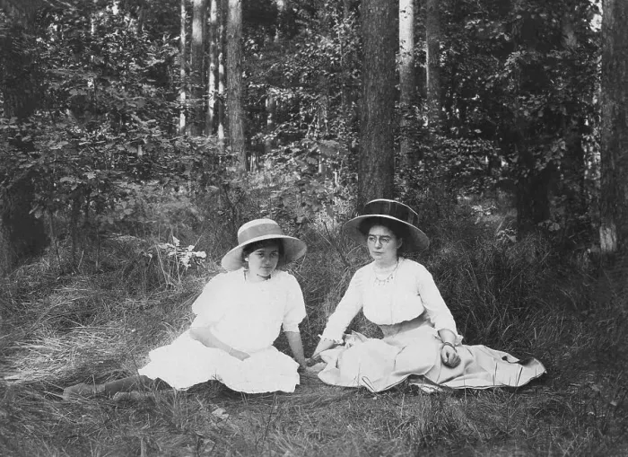 Framed Print : Fashion, summer outing, two women in summer clothes sitting in the forest Framed Print : Fashion, summer outing, two women in summer clothes sitting in the forest