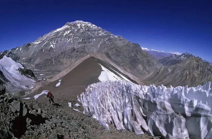 Framed Print : Female climber near a penitentes field with Aconcagua westface in the background Mendoza Argentina