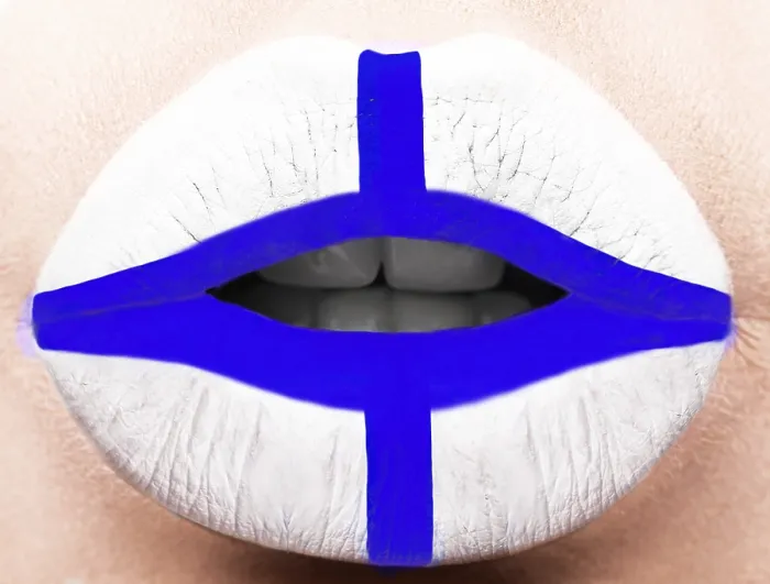 Framed Print : Female lips close up with a picture of the flag of Finland