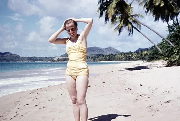 Framed Print : Female tourist in swimming costume on the sandy beach of Vigie, St Lucia, Windward Islands, West Indies, 1962