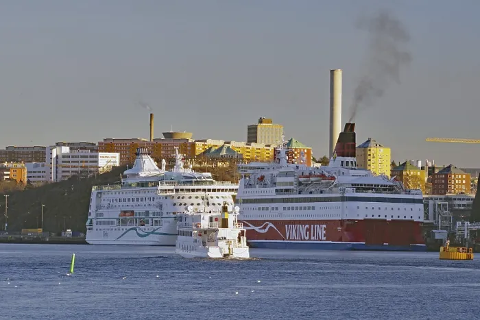 Framed Print : Ferries to Finland and the Baltic States in the harbour with the city skyline as a backdrop
