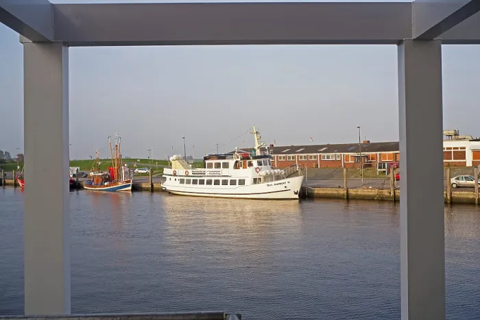 Framed Print : Ferry boat, jetty, North Sea island
