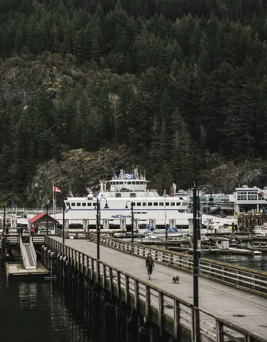 Framed Print : Ferry moored at a wooden pier with a dense forest and mountainous backdrop in Horseshoe Bay Framed Print : Ferry moored at a wooden pier with a dense forest and mountainous backdrop in Horseshoe Bay
