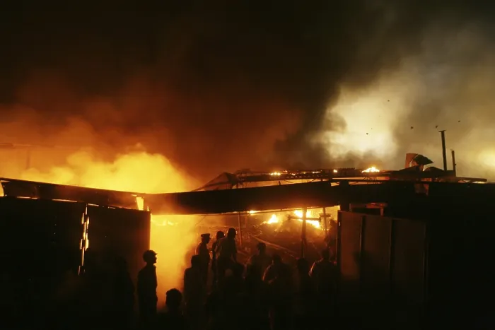 Framed Print : Fire men fighting the fire which broke inside a junkyard at Mandala in Mankhurd