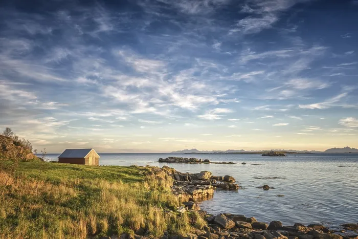 Framed Print : Fisherman's cabin on the fjord in the evening light
