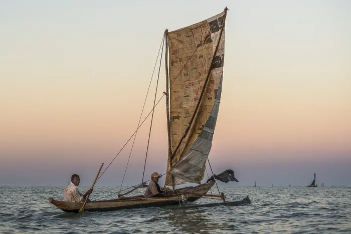 Framed Print : Fishermen at sunrise in traditional Pirogue outrigger boat on the Indian Ocean Framed Print : Fishermen at sunrise in traditional Pirogue outrigger boat on the Indian Ocean