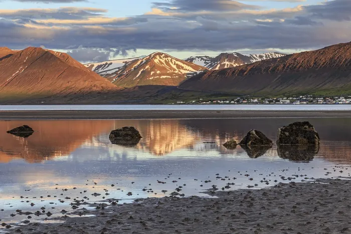 Framed Print : Fjord, low tide, stones, mountains reflected in the water Framed Print : Fjord, low tide, stones, mountains reflected in the water