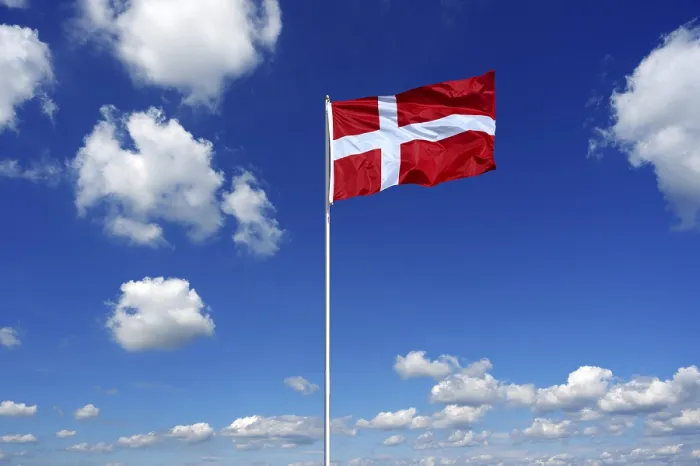 Framed Print : Flag of Denmark fluttering in the blue sky with cumulus clouds Framed Print : Flag of Denmark fluttering in the blue sky with cumulus clouds