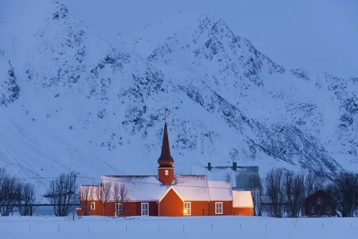 Framed Print : Flakstad Church at night in the snow in winter