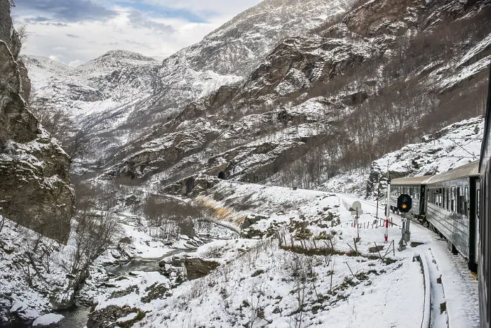 Framed Print : Flambahn journey through the mountains of winter Norway