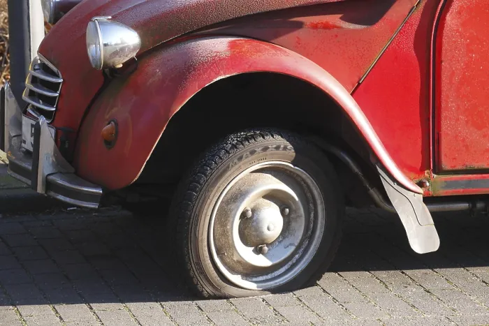 Framed Print : Flat tire on vintage car, Citroen 2CV Ente Framed Print : Flat tire on vintage car, Citroen 2CV Ente