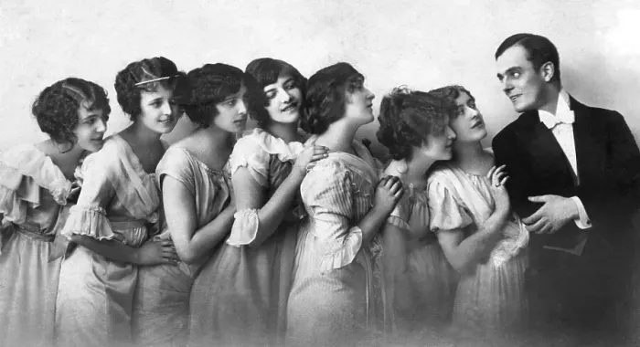 Framed Print : Flirt, seven women are interested in one man