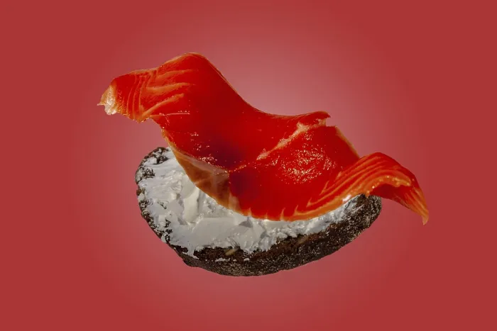 Framed Print : Flying sandwich with salted trout and cheese on red background Framed Print : Flying sandwich with salted trout and cheese on red background