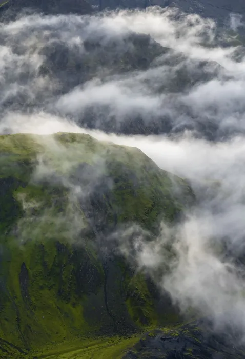Framed Print : Fog, clouds moving around moss-covered mountains