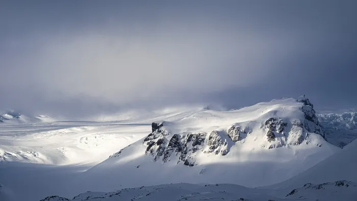 Framed Print : Fog, light and shadow on the snowy summit of Breidamerkurfjall