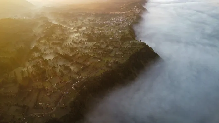 Framed Print : Fog lying between the mountains at sunrise