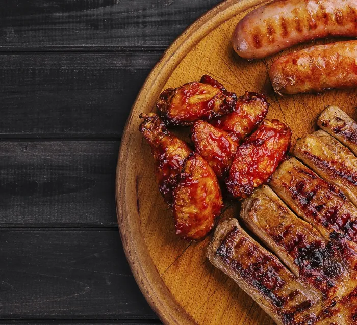 Framed Print : Food, Pork ribs with chicken and sausages on wooden board