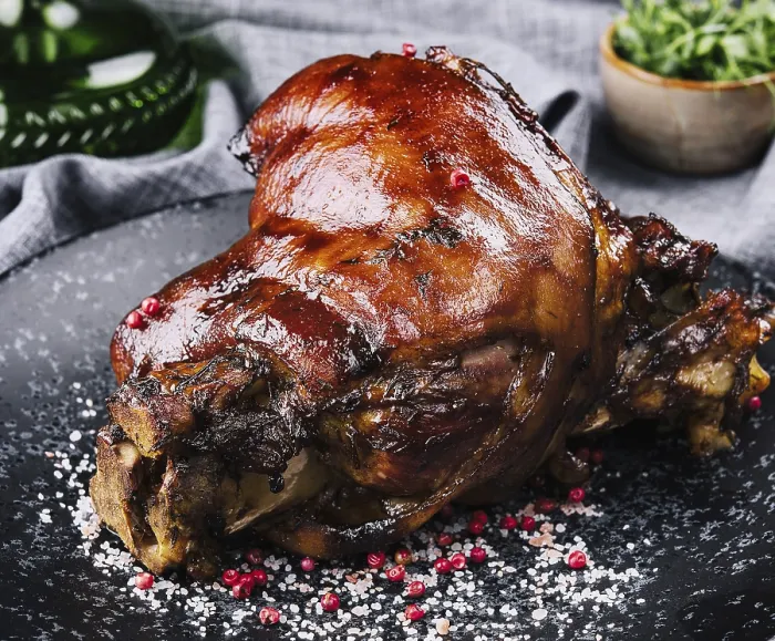 Framed Print : Food, Roast pork knuckle on black plate Framed Print : Food, Roast pork knuckle on black plate