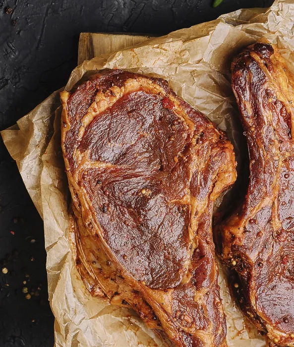 Framed Print : food still-life, Marinated pork steaks on cutting board for cooking