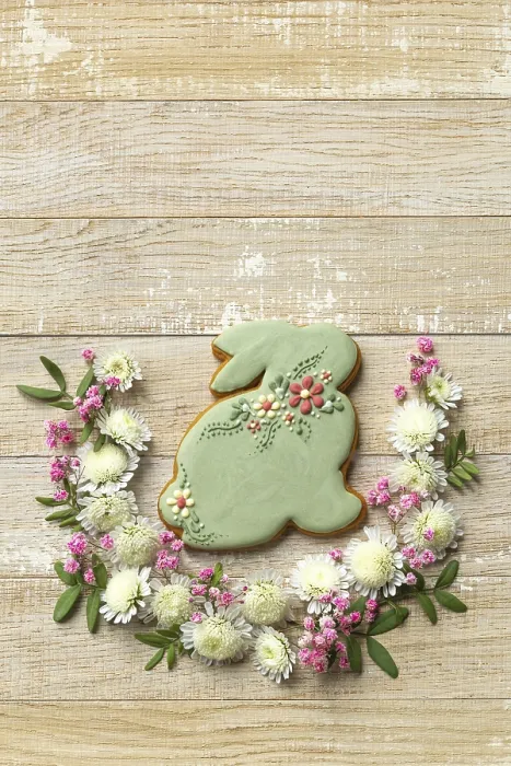 Framed Print : Food, Wooden background with easter bunny cookies and flowers