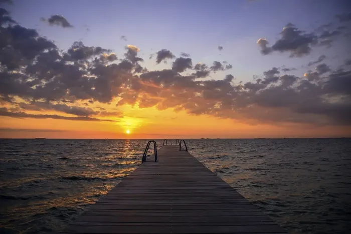 Framed Print : Footbridge at sunrise over the sea Framed Print : Footbridge at sunrise over the sea
