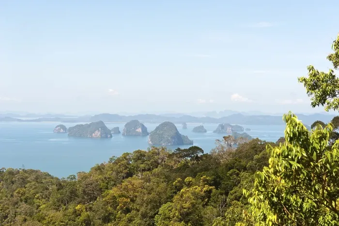 Framed Print : Forested Karst islands rising from the sea