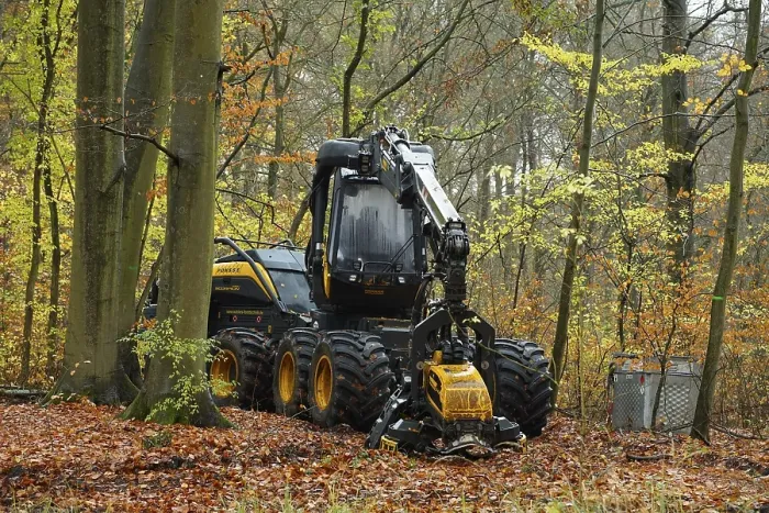Framed Print : A forestry harvester parked in a deciduous forest Framed Print : A forestry harvester parked in a deciduous forest