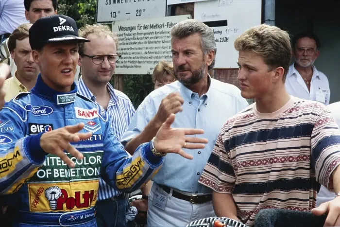 Framed Print : Formula 1 driver Michael Schumacher in a blue racing suit talking to his manager Willi Weber (centre) and his brother Ralf Schumacher (right), here visiting the karting track in Kerpen in July 1994, Germany, Europe Framed Print : Formula 1 driver Michael Schumacher in a blue racing suit talking to his manager Willi Weber (centre) and his brother Ralf Schumacher (right), here visiting the karting track in Kerpen in July 1994, Germany, Europe