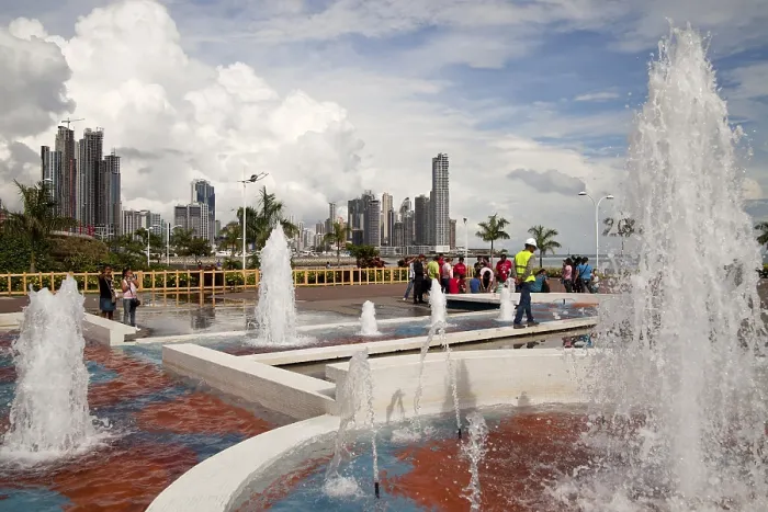 Framed Print : Fountains on the refurbished seafront promenade of Cinta Costera and the skyline of Panama City