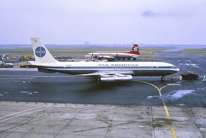 Framed Print : Four-engine jet aircraft Boeing 707 (N719PA) of Pan American and propeller aircraft Bristol 175 Britannia 313 of British Eagle International Airlines at Kennedy Airport New York