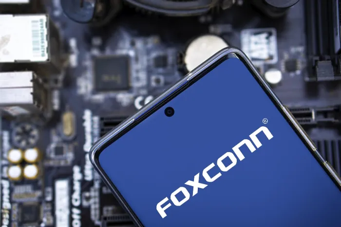 Framed Print : Foxconn company Logo on Smartphone Framed Print : Foxconn company Logo on Smartphone