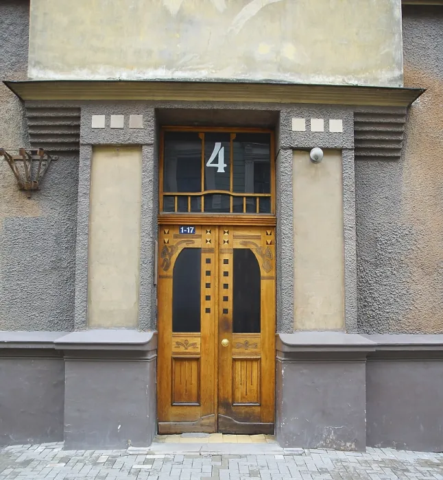 Framed Print : Fragment of the facade with the door of a residential building in the style of national romanticism on one of