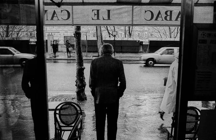 Framed Print : France, Paris, 22.03.1990, man in front of a restaurant