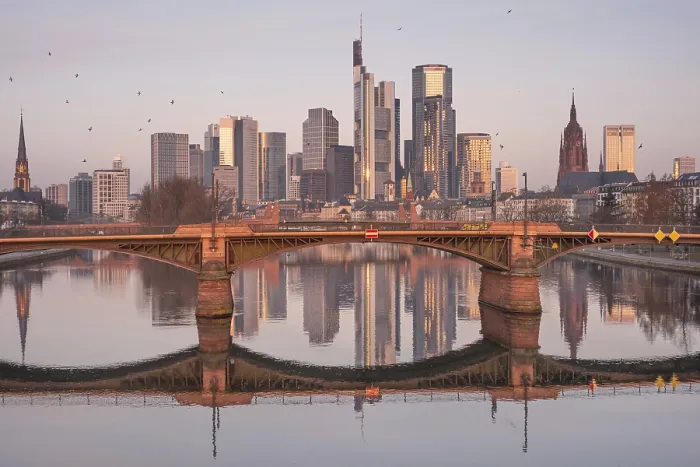 Framed Print : The Frankfurt bank skyline is reflected in the Main River in the morning