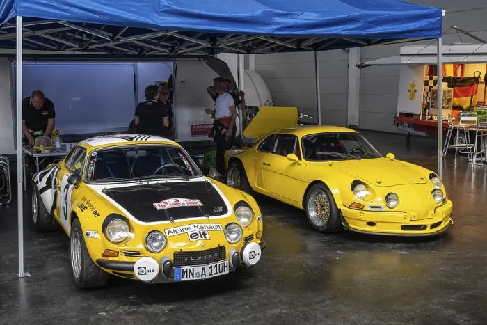 Framed Print : French Renault Alpine A110 racing cars in a paddock