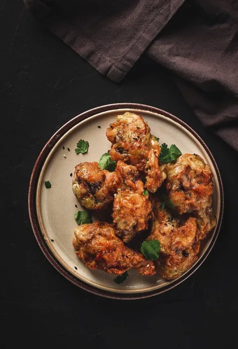 Framed Print : Fried chicken legs, breaded, with spices and herbs