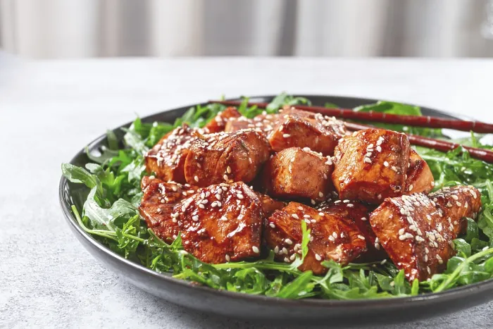 Framed Print : Fried salmon slices, teriyaki with sesame seeds