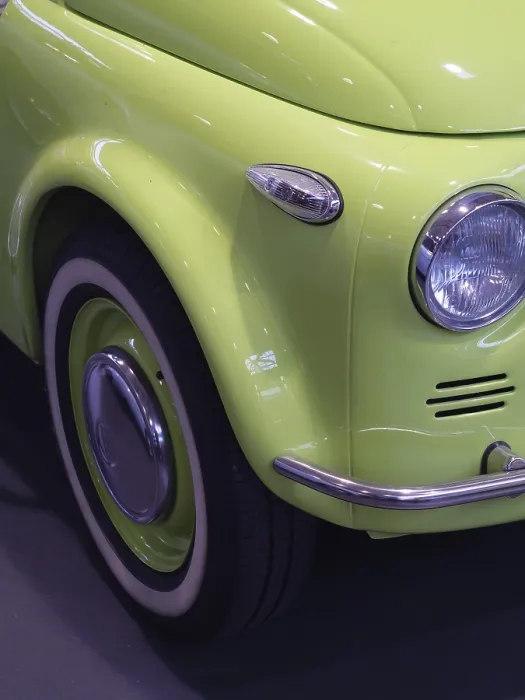 Framed Print : Frontal view of a light green classic car with shiny wheel Framed Print : Frontal view of a light green classic car with shiny wheel