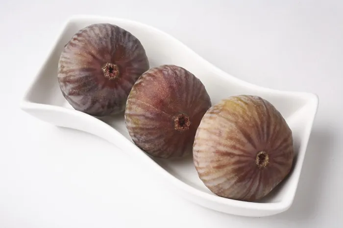Framed Print : Fruit, Figs kept ins shape white plate Ficus Carica Anjir on white background