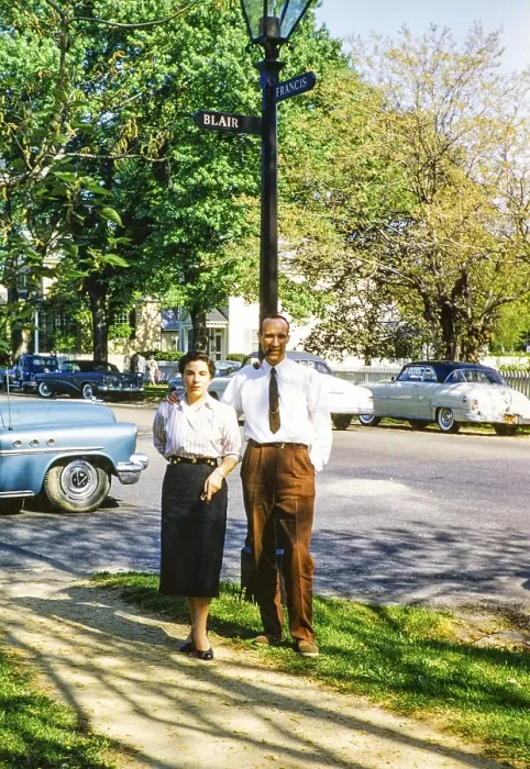 Framed Print : Full-length portrait of an elegantly dressed man and woman standing on the street next to a lamppost, Williamsburg, Virginia, USA, c. 1953 Man smoking a pipe, North America Framed Print : Full-length portrait of an elegantly dressed man and woman standing on the street next to a lamppost, Williamsburg, Virginia, USA, c. 1953 Man smoking a pipe, North America